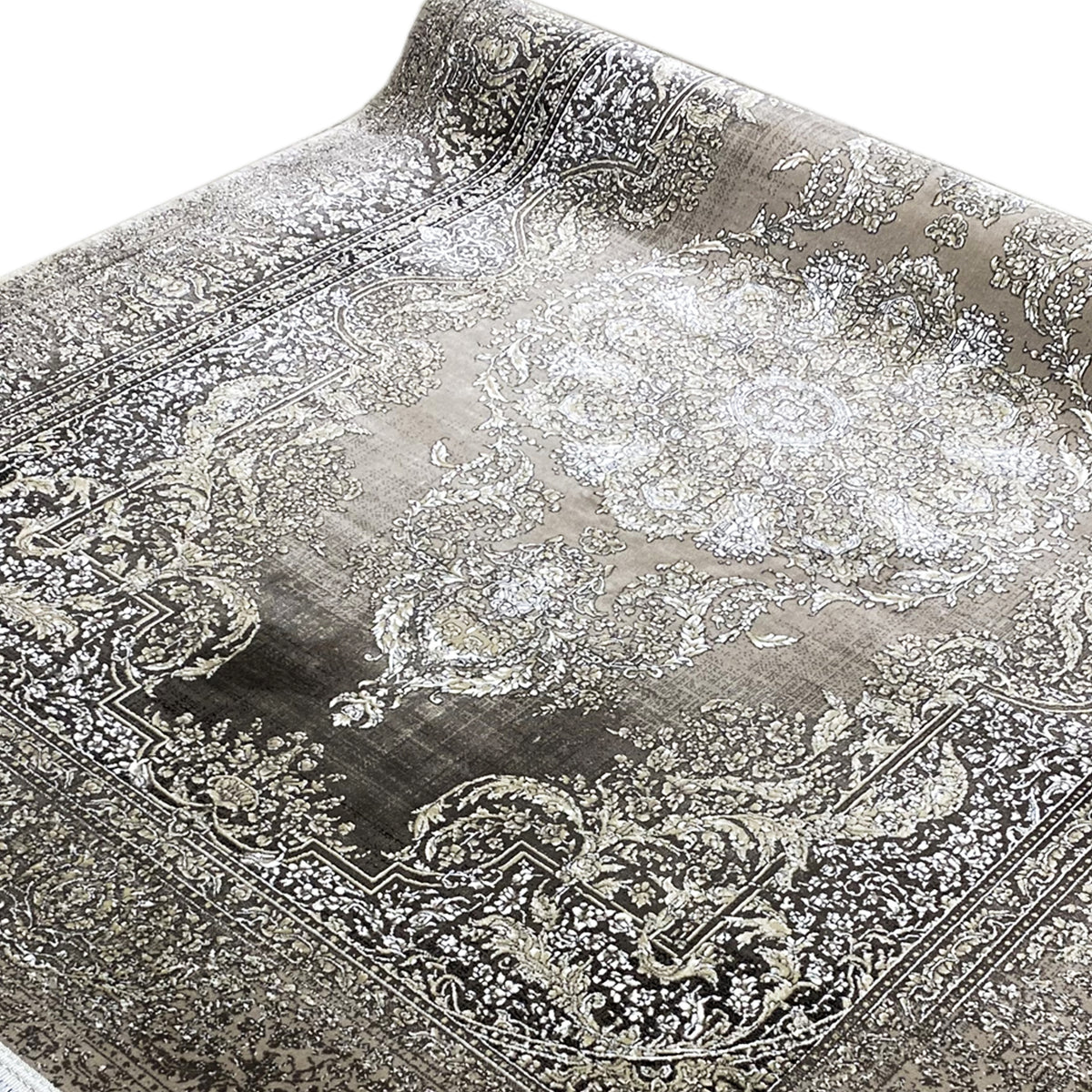 Rug with large medallions and delicate ornaments, silver-gray on a dark background