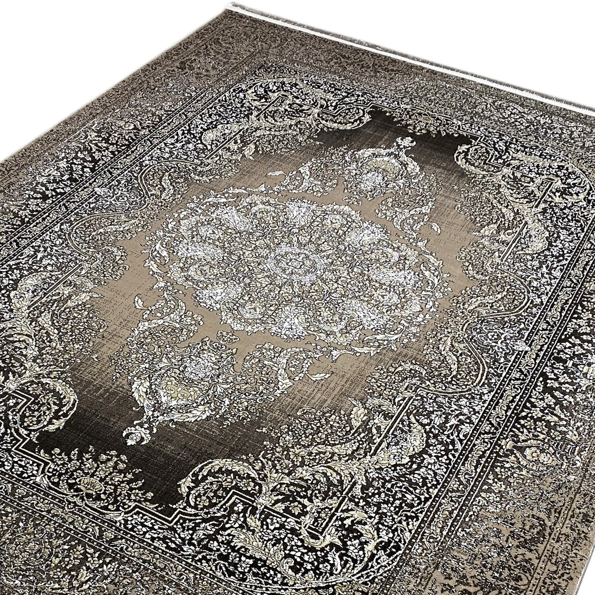 Carpet detail: delicate ornamental pattern and medallion, silver-colored on dark gray