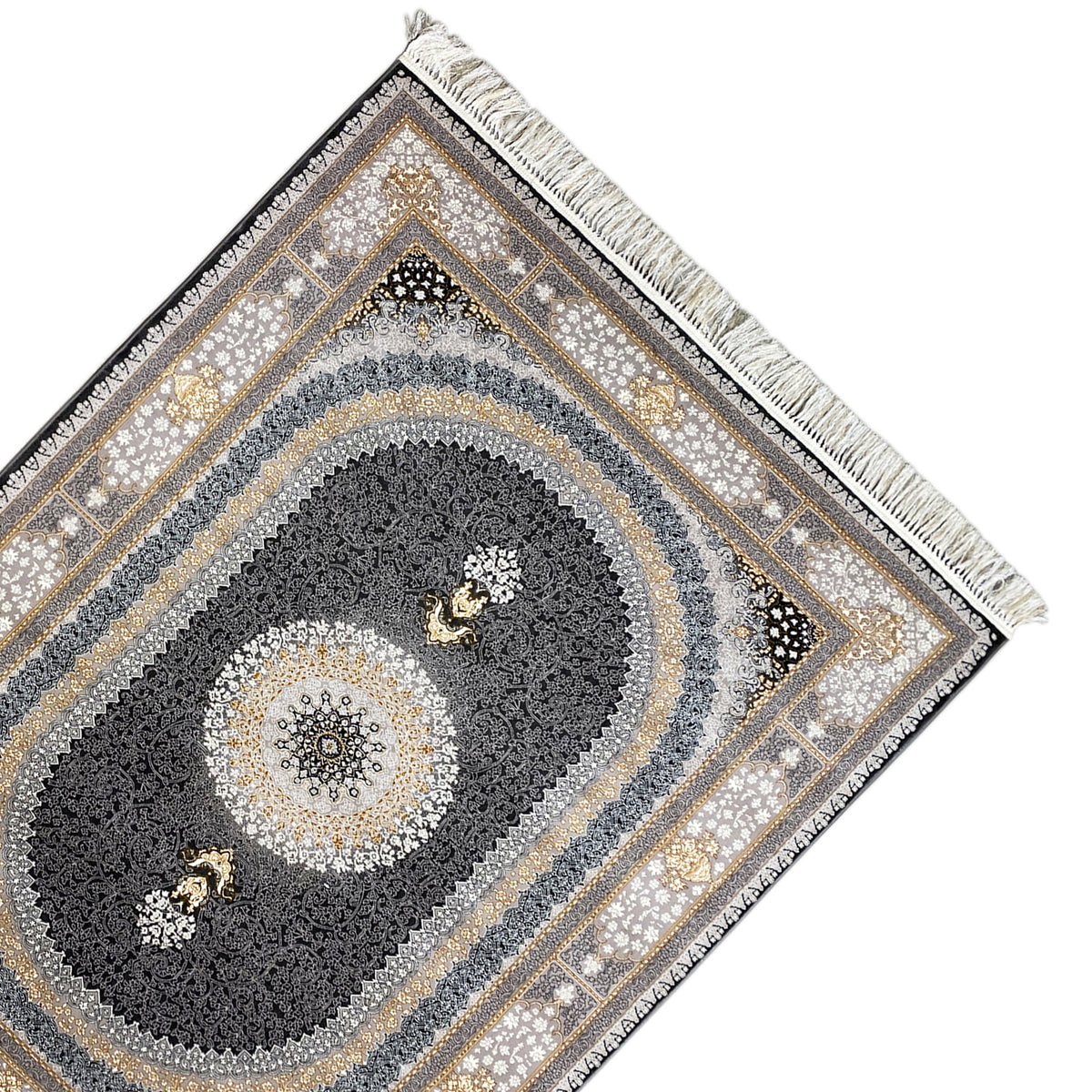 Ornamental rug photographed at an angle: central medallion, dark border, and fringe