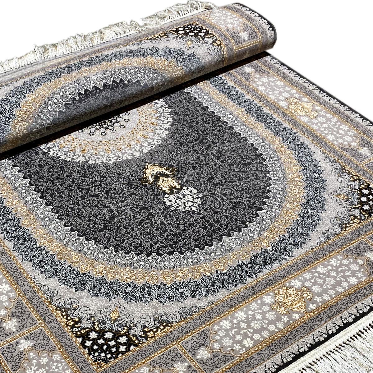 “Lara” rug close-up: dark pile ornament with a circular pattern and fringes