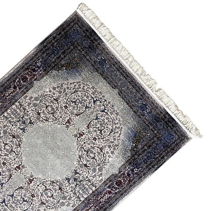 Rug Sofia 160x230 cm, detail view: medallion in the light center, dark blue border