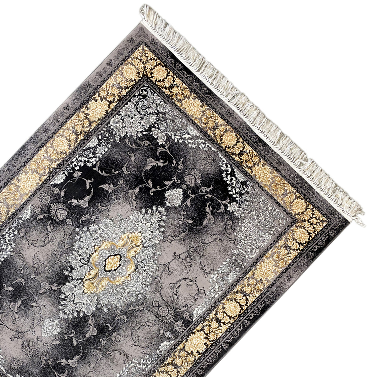 Carpet corner with a gray ornamental pattern, gold border, and white fringe