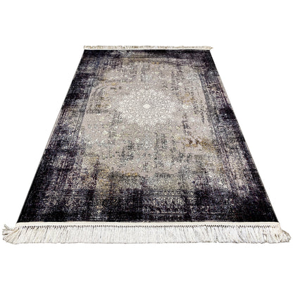 Rectangular vintage rug with an abstract vintage pattern, dark border, and fringes all around