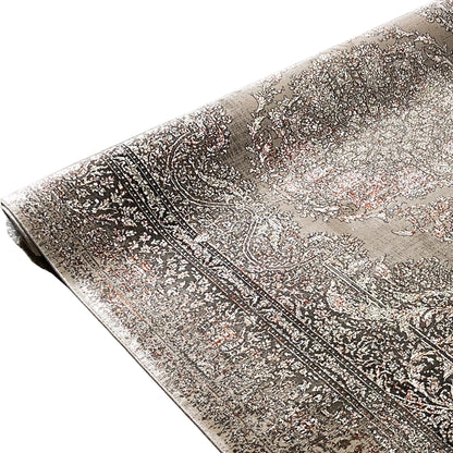 Oriental rug with paisley motifs and an even pattern in gray and dark brown