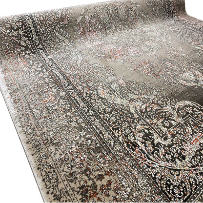Oriental rug with a dense pile and floral motifs in gray and black