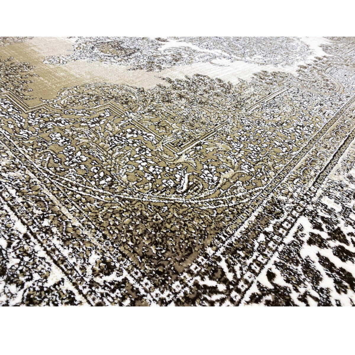 Close-up of the rug: detailed ornament in cream, silver, and dark accents