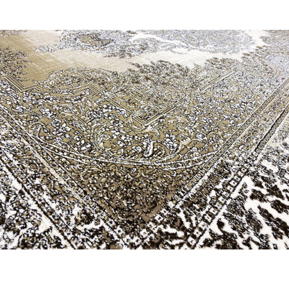 Close-up of the rug: detailed ornament in cream, silver, and dark accents