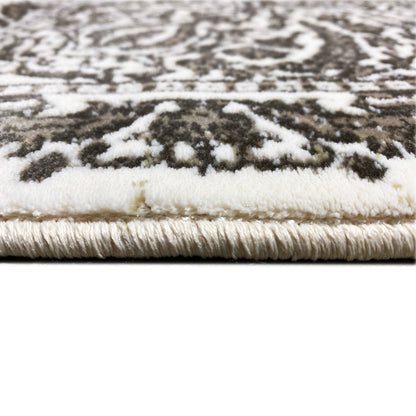 Carpet detail with pile height and bound edge, cream-and-silver pattern