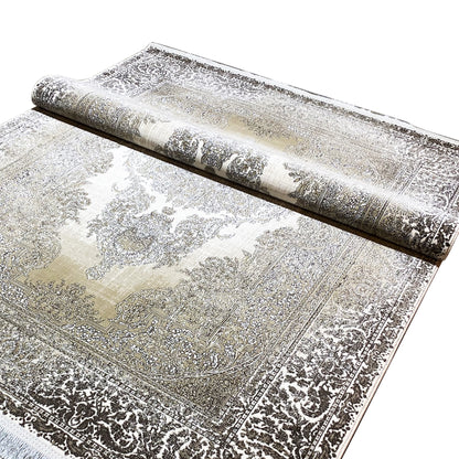 Carpet 170x240 cm, cream-silver, shown rolled, with fine textured and ornamental details
