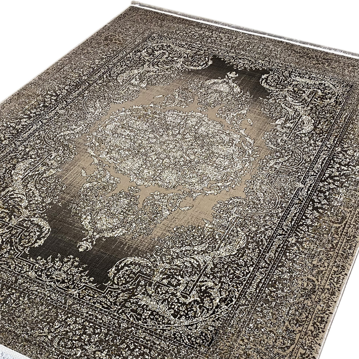 Carpet close-up of the central ornament, brown-gray with beige details
