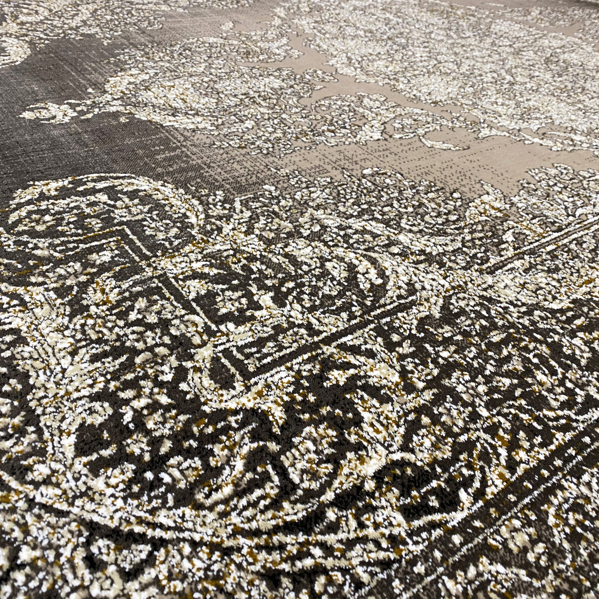 Carpet surface with a fine ornamental pattern and texture, brown-gray, beige accents