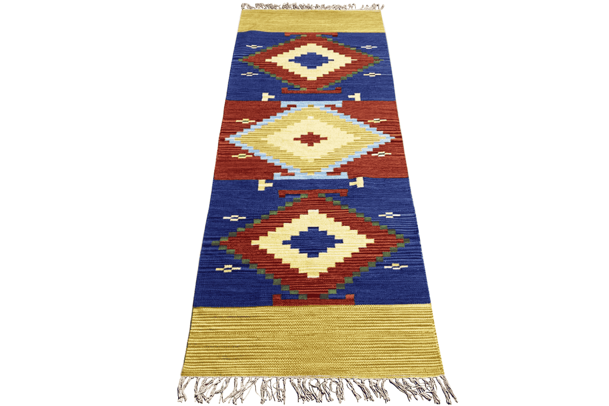 Wool kilim runner with geometric diamonds in blue, red and cream, yellow edging, fringes