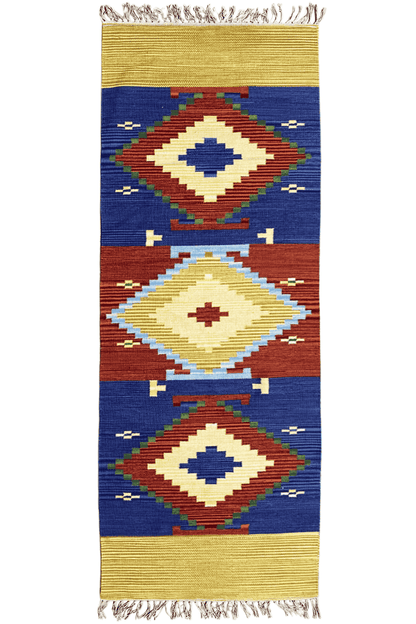 Wool kilim runner with geometric diamonds in blue, red, cream, and a yellow border, with fringes