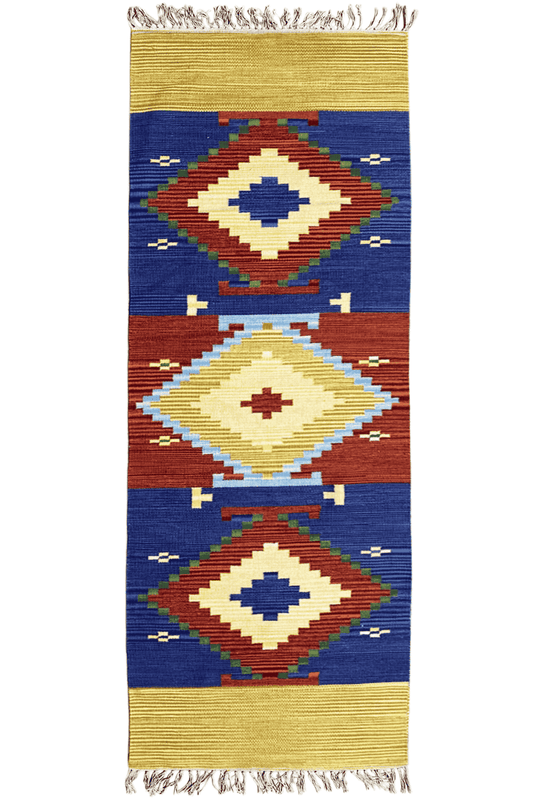 Wool kilim runner with geometric diamonds in blue, red, cream, and a yellow border, with fringes