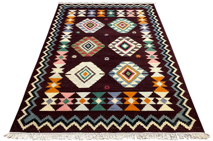 Triangle-shaped kilim rug with colorful diamonds and a zigzag border, dark red, fringes