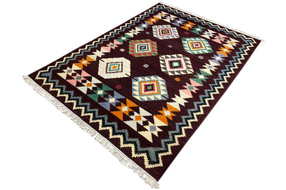 Kilim rug with a multicolored geometric pattern and zigzag border, dark red, fringes