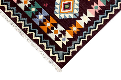 Kilim rug with a zigzag pattern and diamonds, dark red, cream and turquoise, fringe at the corner