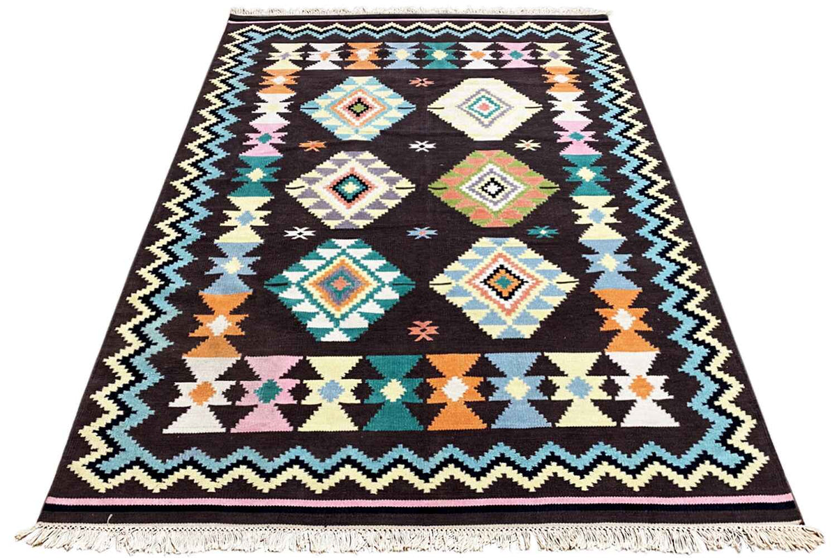 Kilim rug with zigzag and square patterns, black base, turquoise, orange and white