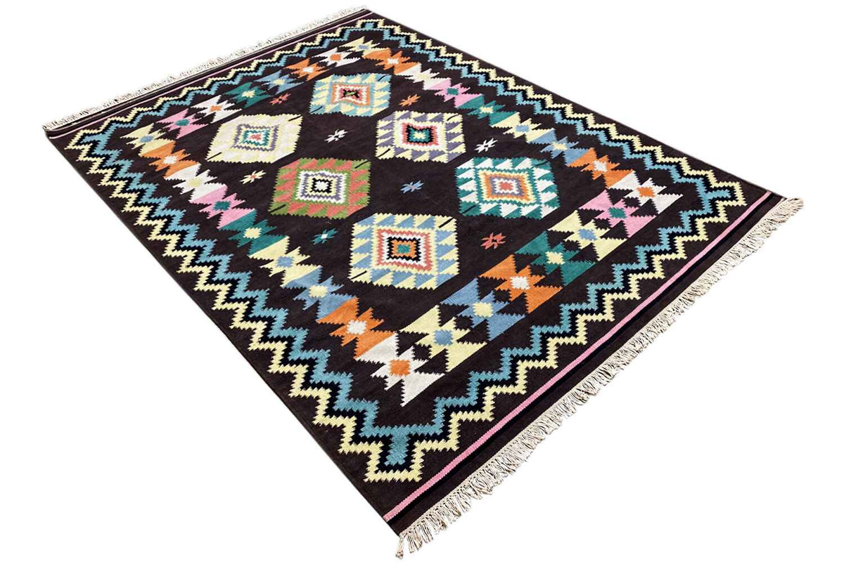 Kilim rug with square diamonds in a tribal style on a dark purple-black background
