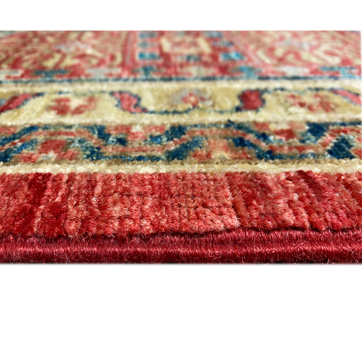 Mamluk carpet: pile and fringe along the edge, red with turquoise-blue ornamental stripes