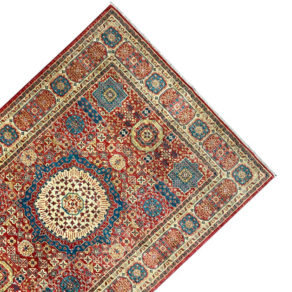 Mamluk carpet corner with a red border, blue corner motif, and central medallion