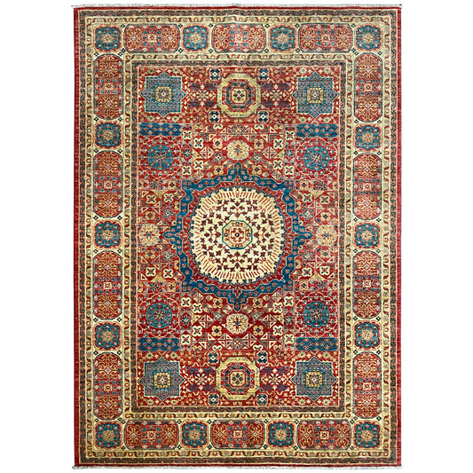 Mamluk rug with a red ornamental pattern, central medallion and blue-cream border