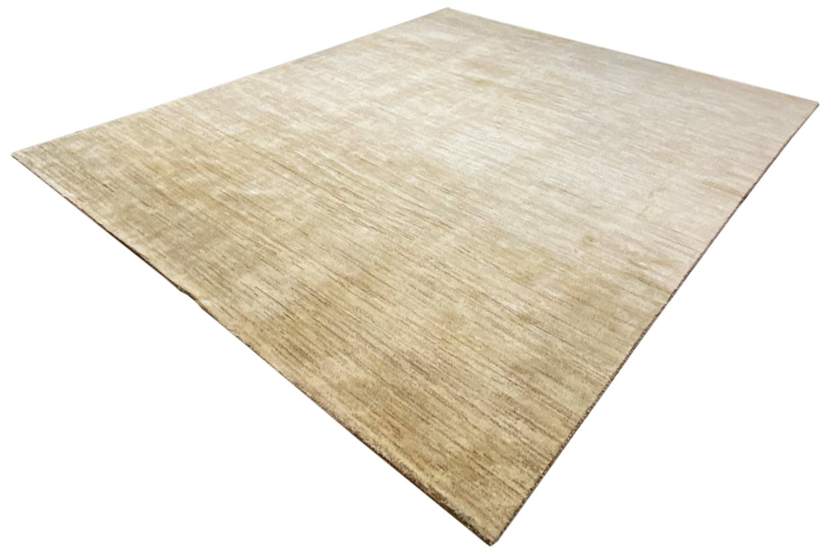Gabbeh rug in light beige with a subtle linear texture, arranged in a triangular pattern
