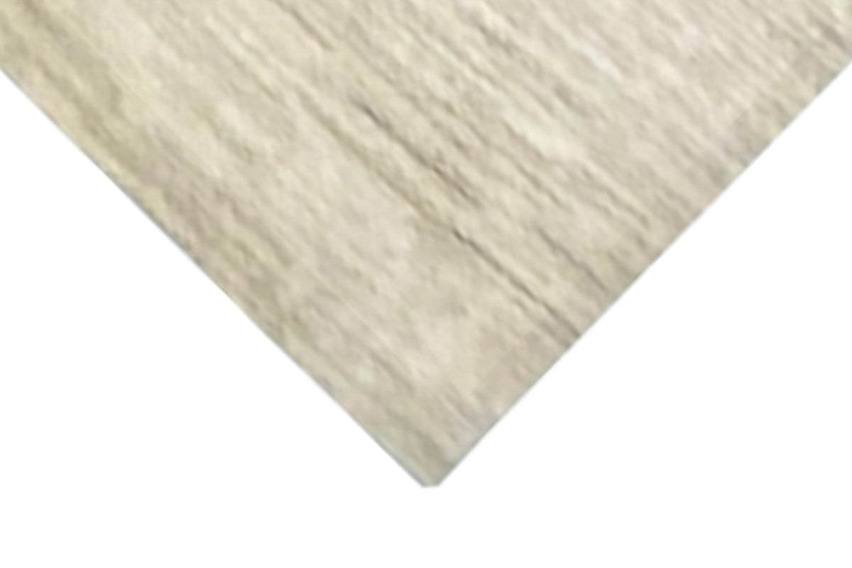 Gabbeh rug close-up, light beige-toned pile texture with fine strands