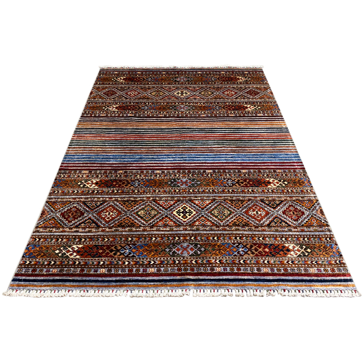 Colorful khorjin rug in triangular perspective with stripes and diamonds, fringes