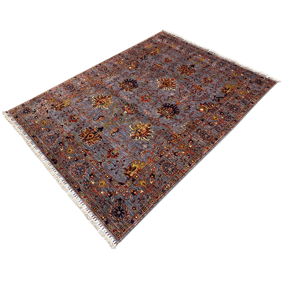 Gray Oriental rug with floral ornaments, diagonally oriented, fringes