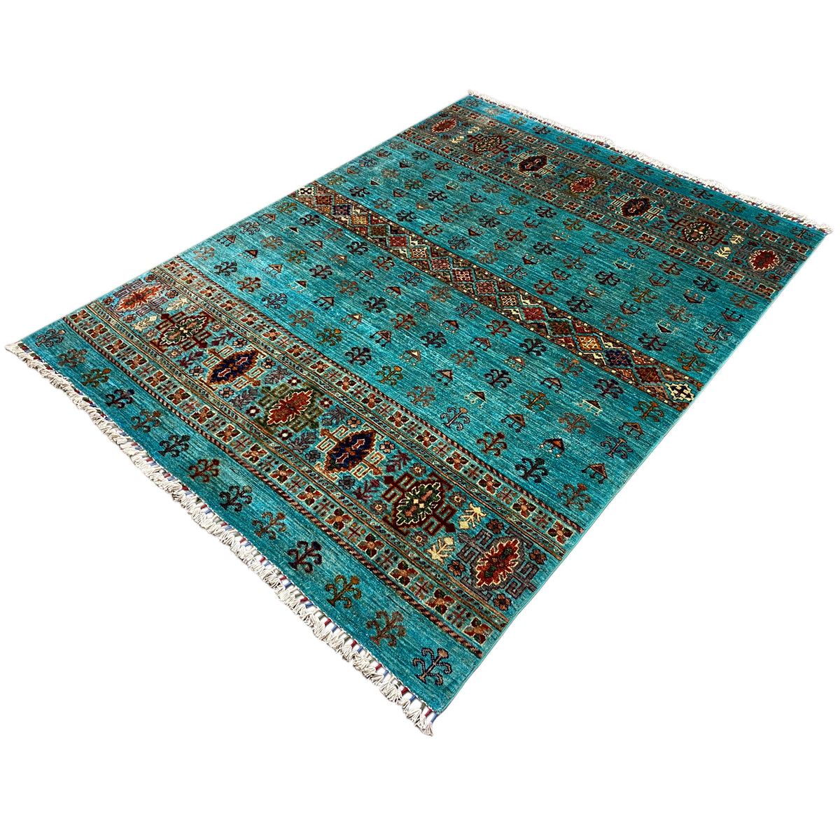 Turquoise rug with ornamental stripes, diagonal view and fringes
