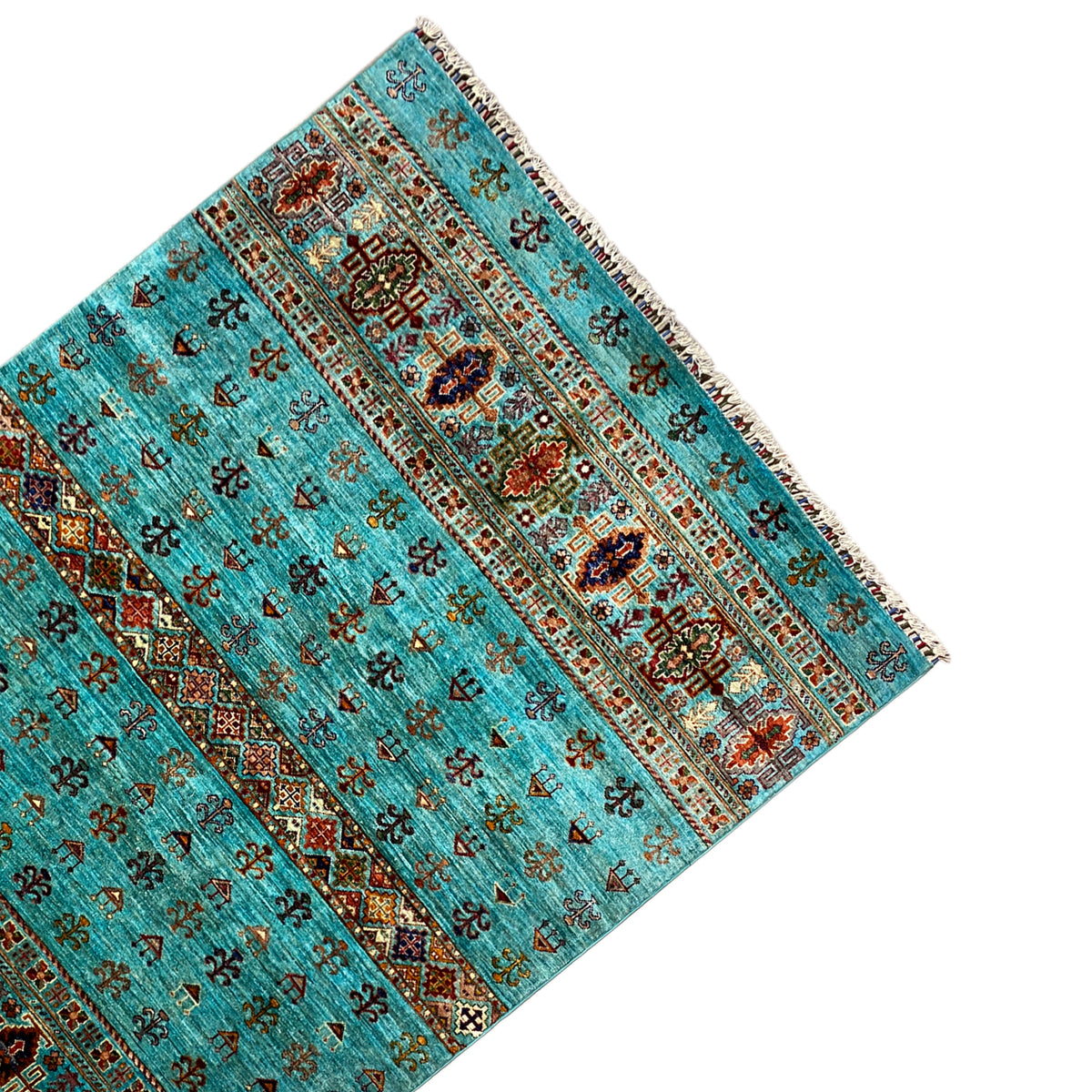 Turquoise carpet with border stripes, side view and fringes along the edge