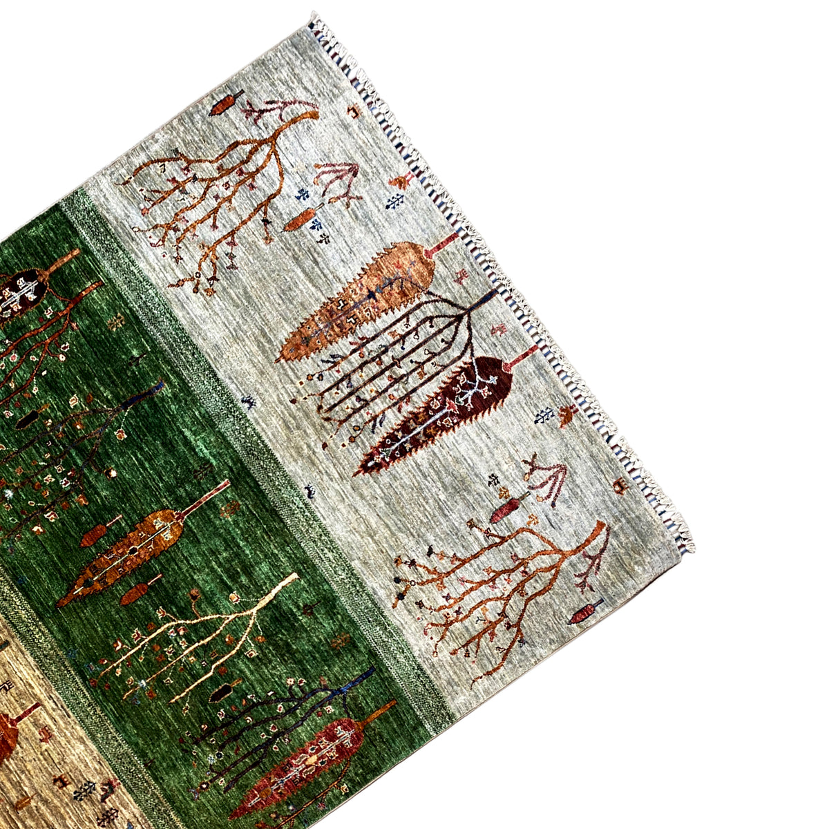 Khorjin rug corner with tree ornaments in orange, green and beige, with fringes