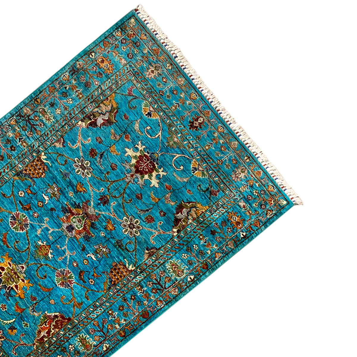 Turquoise Khorjin rug, diagonal view of the pattern with decorative borders