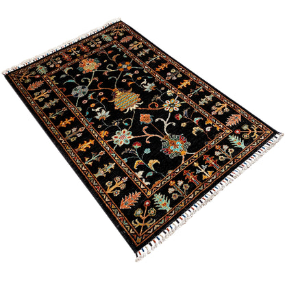 Khorjin rug in diagonal view: dark geometric pattern with floral and vine ornaments, fringes