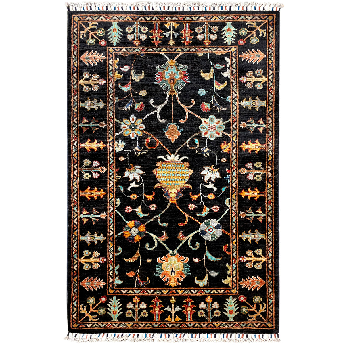 Khorjin rug with a dark background, bold ornamental pattern and colorful details, with fringes