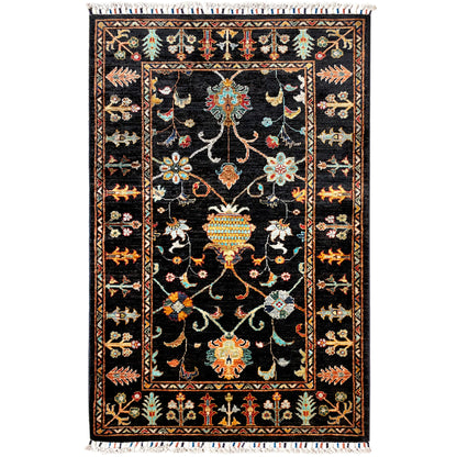 Khorjin rug with a dark background, bold ornamental pattern and colorful details, with fringes