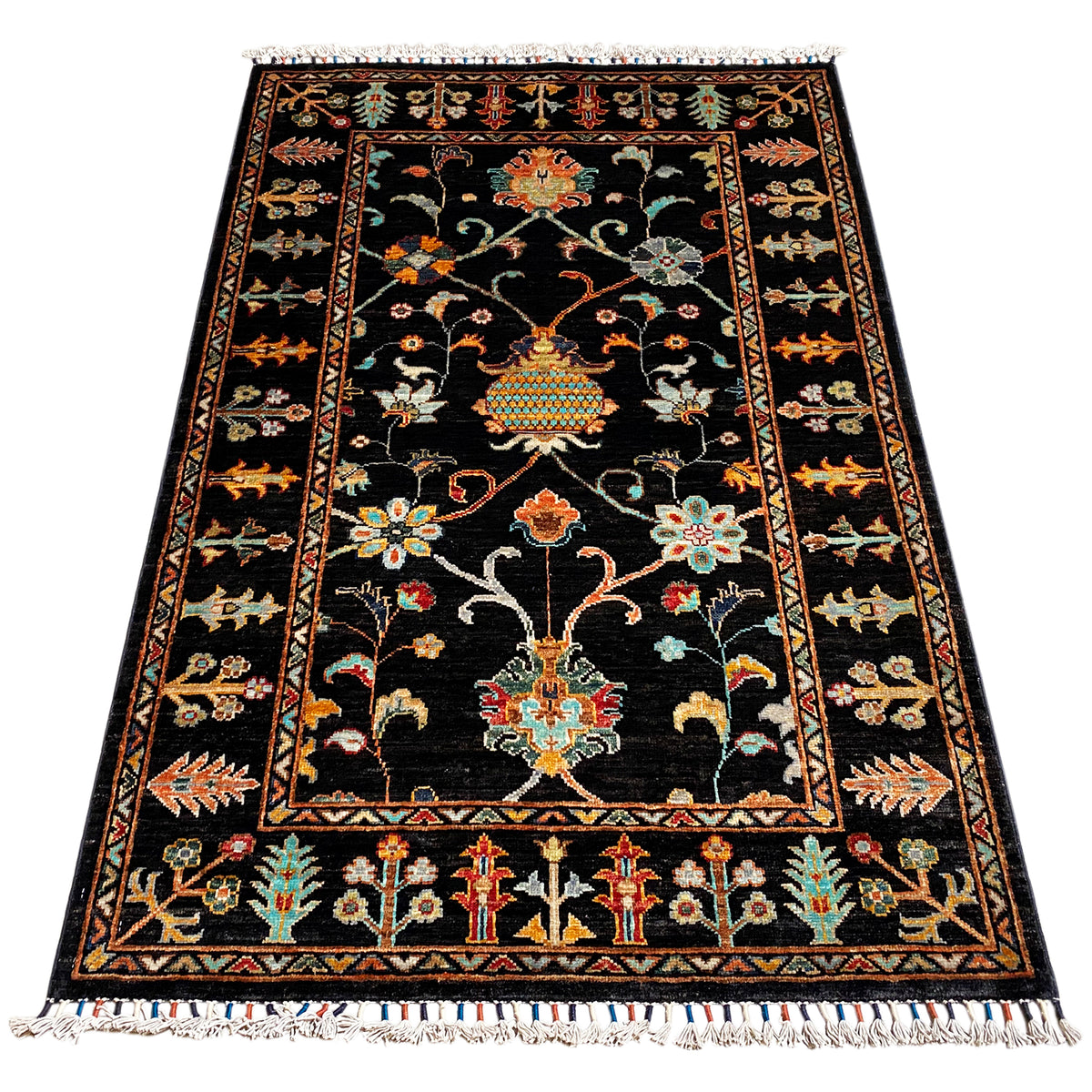 Khorjin rug 143x96 cm, black pile with colorful floral and medallion motifs, fringes