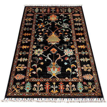 Khorjin rug 143x96 cm, black pile with colorful floral and medallion motifs, fringes
