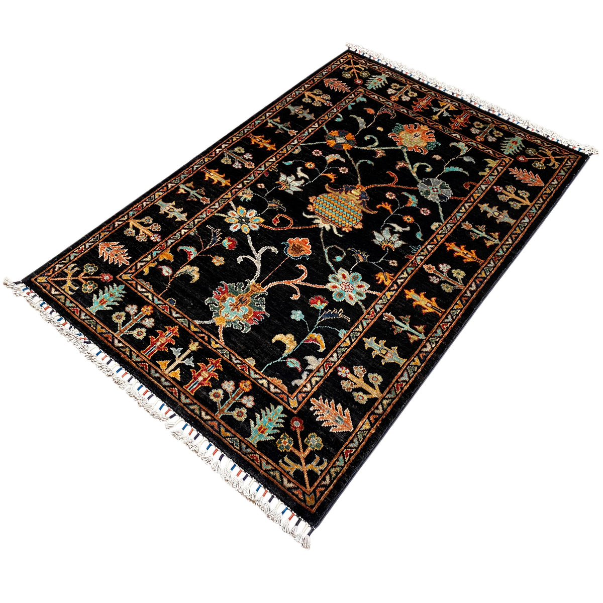 Khorjin rug 143x96 cm, black rug with a colorful floral pattern and decorative border, fringe