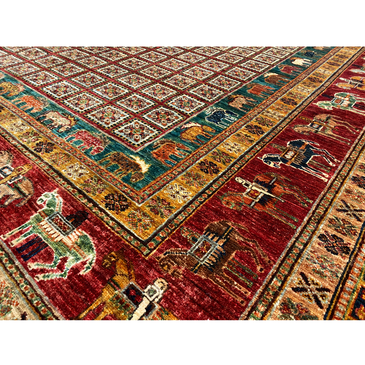 Detail of the Khorjin carpet: red field with ornaments, turquoise and gold accents