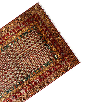 Khorjin carpet viewed from above at an angle, red interior grid with green accents
