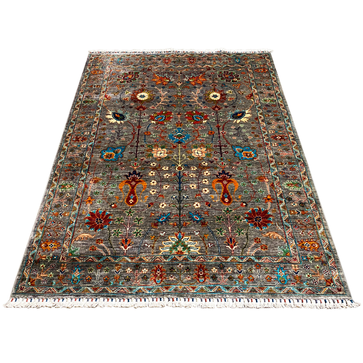 Gray Khorjin rug, rectangular, spread out; intricate multicolored medallion and line pattern