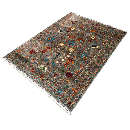 Gray Khorjin carpet with an ornate central field and border; corner motifs, hemmed on both sides