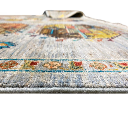Ziegler carpet: close-up of the pile height at the edge, light blue background with a pattern