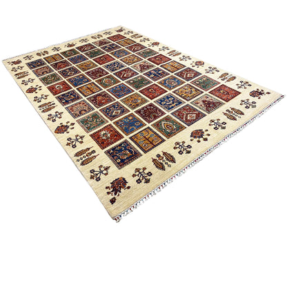 Wool rug with a diagonal view: colorful patchwork tile design and decorative border