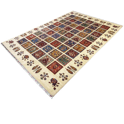 Wool rug in a diagonal view: colorful tile pattern with a delicate embroidered border