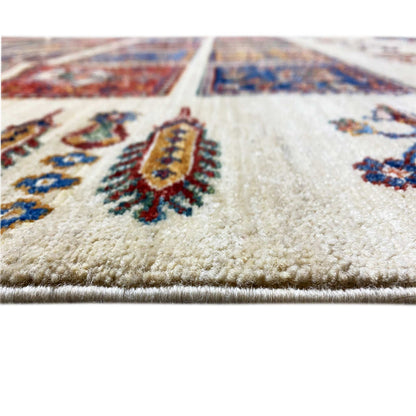 Wool rug detail: dense pile on a light background with a tile pattern in the crop