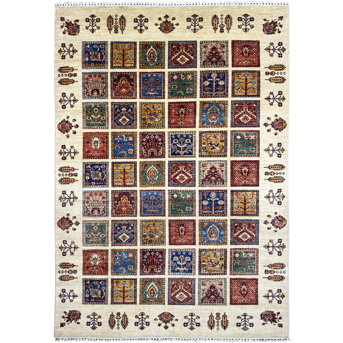 Hand-knotted wool rug with a Khorjin tile pattern, cream-colored background, and decorative border