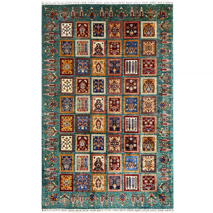 Ziegler rug: multicolored tile pattern on a petrol-blue background, with fringes